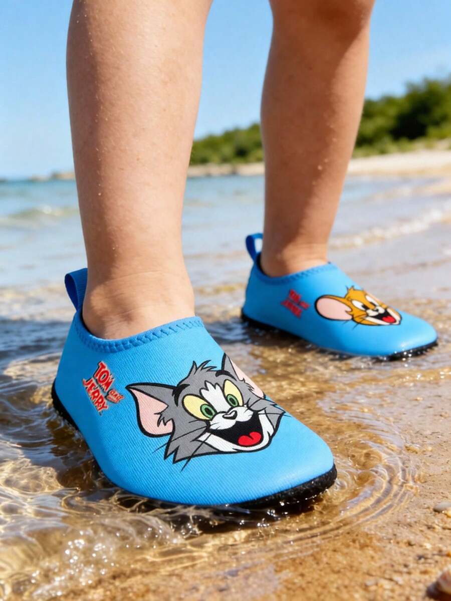 Girls cartoon pattern non-slip water shoes with slip-on closure and durable TPR outsole for beach and outdoor sports.