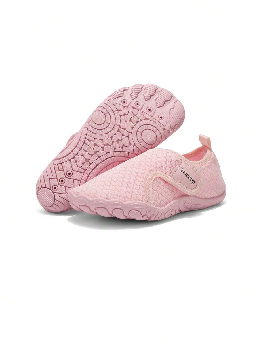 Kids breathable mesh water shoes with hook and loop closure and durable rubber outsole.