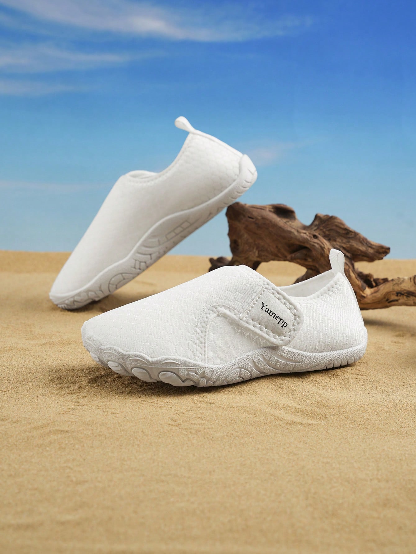 Kids breathable mesh water shoes with hook and loop closure and durable rubber outsole.