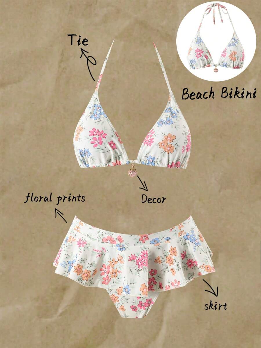Women's 70s retro black and white polka dot bikini set featuring a halter triangle top and ultra low waist bottoms.