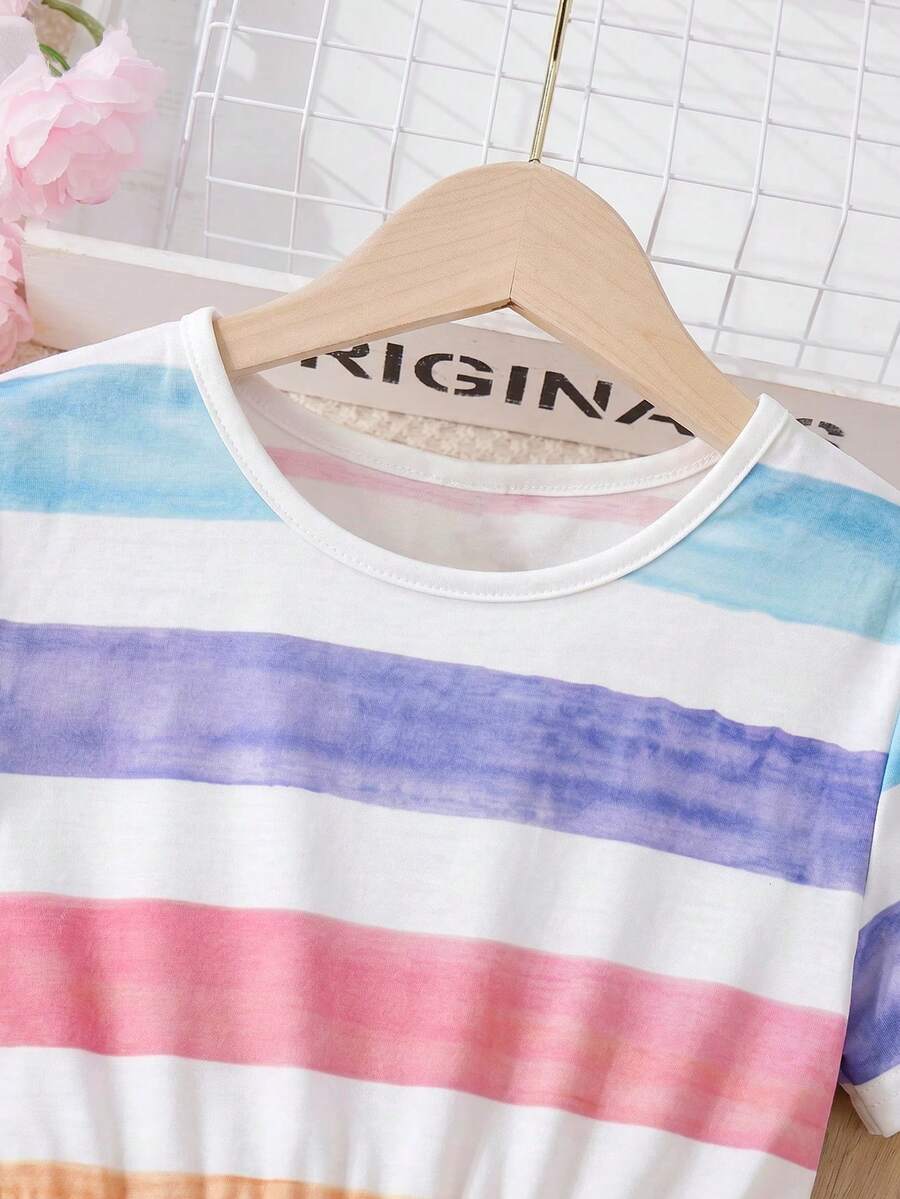 Tween girls casual colorblock short sleeve dress featuring a round neck, high waist flared hem, and button-front details.