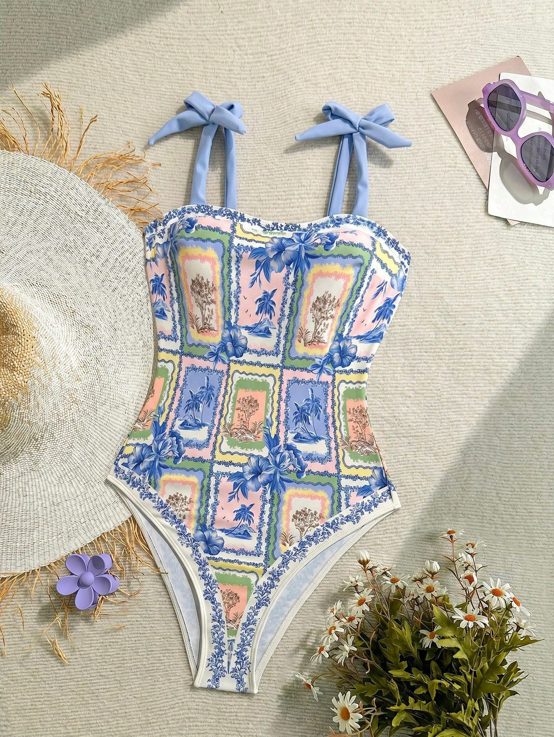 NEWSHEIN tween girls one-piece swimsuit in blue with geometric full print, twist shoulder straps, lined body, and vacation swimwear style.