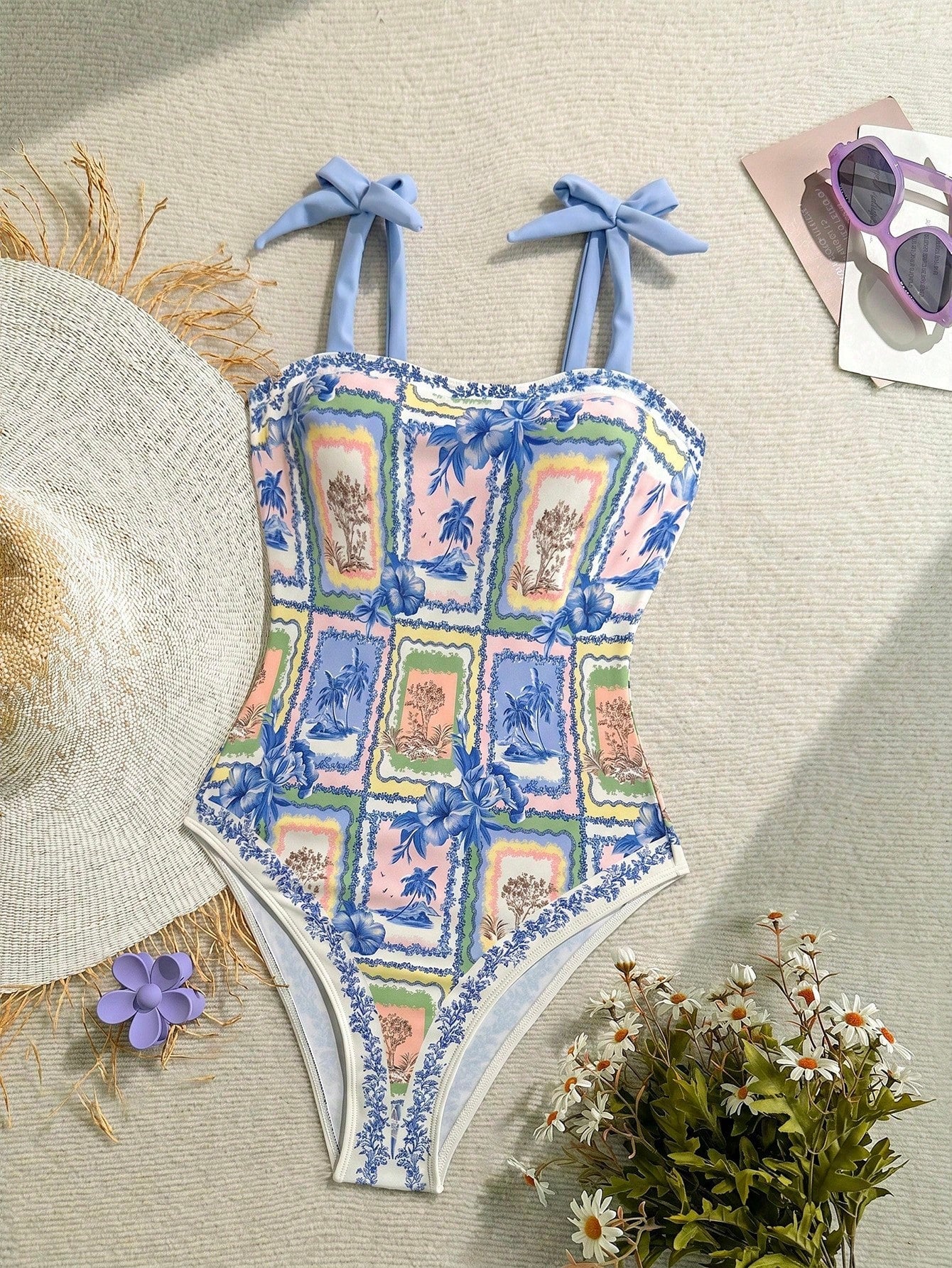 NEWSHEIN tween girls one-piece swimsuit in blue with geometric full print, twist shoulder straps, lined body, and vacation swimwear style.