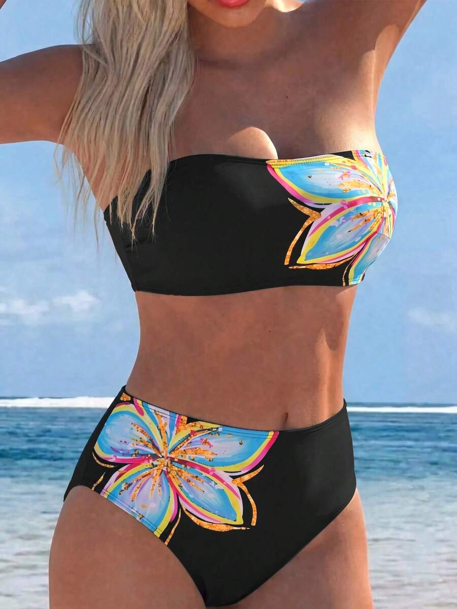 Women's black two-piece bandeau bikini set featuring high waist bottoms, backless buckle closure, and removable padding.