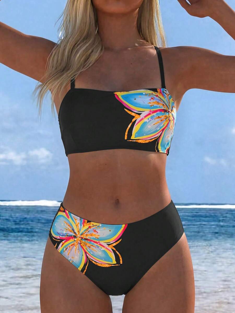 Women's black two-piece bandeau bikini set featuring high waist bottoms, backless buckle closure, and removable padding.