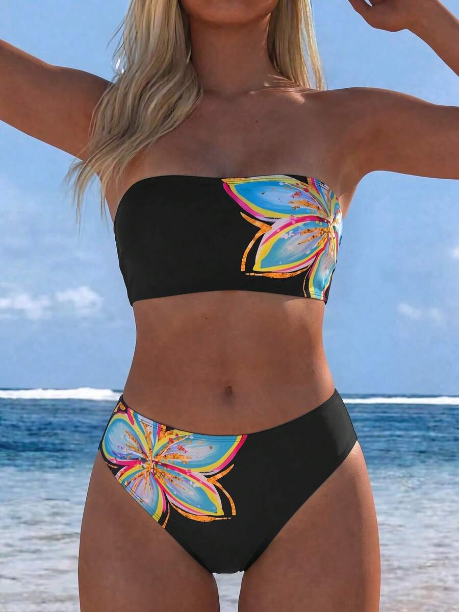Women's black two-piece bandeau bikini set featuring high waist bottoms, backless buckle closure, and removable padding.