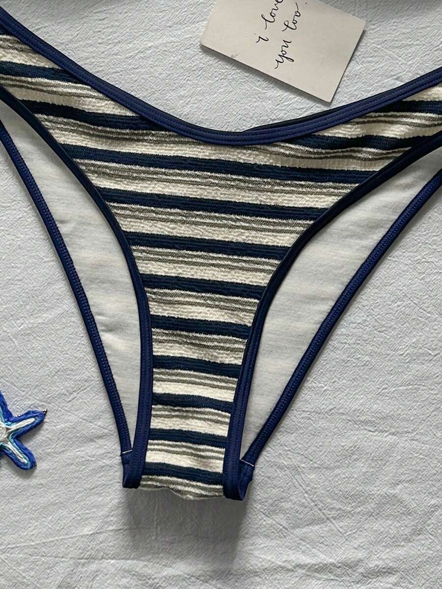 Apricot ribbed high waist two piece bikini swimsuit set for women featuring backless spaghetti strap top and high waisted bottoms.