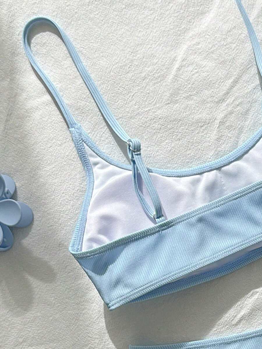 Apricot ribbed high waist two piece bikini swimsuit set for women featuring backless spaghetti strap top and high waisted bottoms.