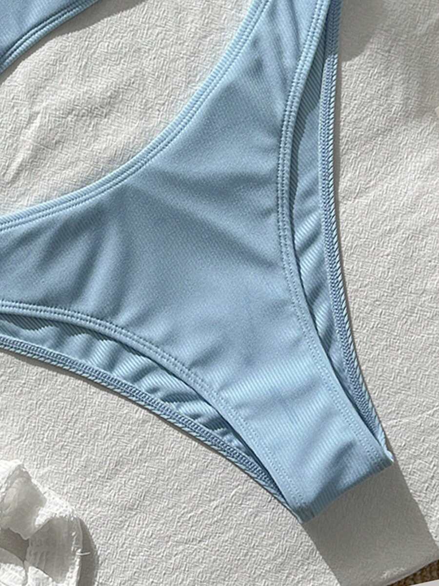Apricot ribbed high waist two piece bikini swimsuit set for women featuring backless spaghetti strap top and high waisted bottoms.