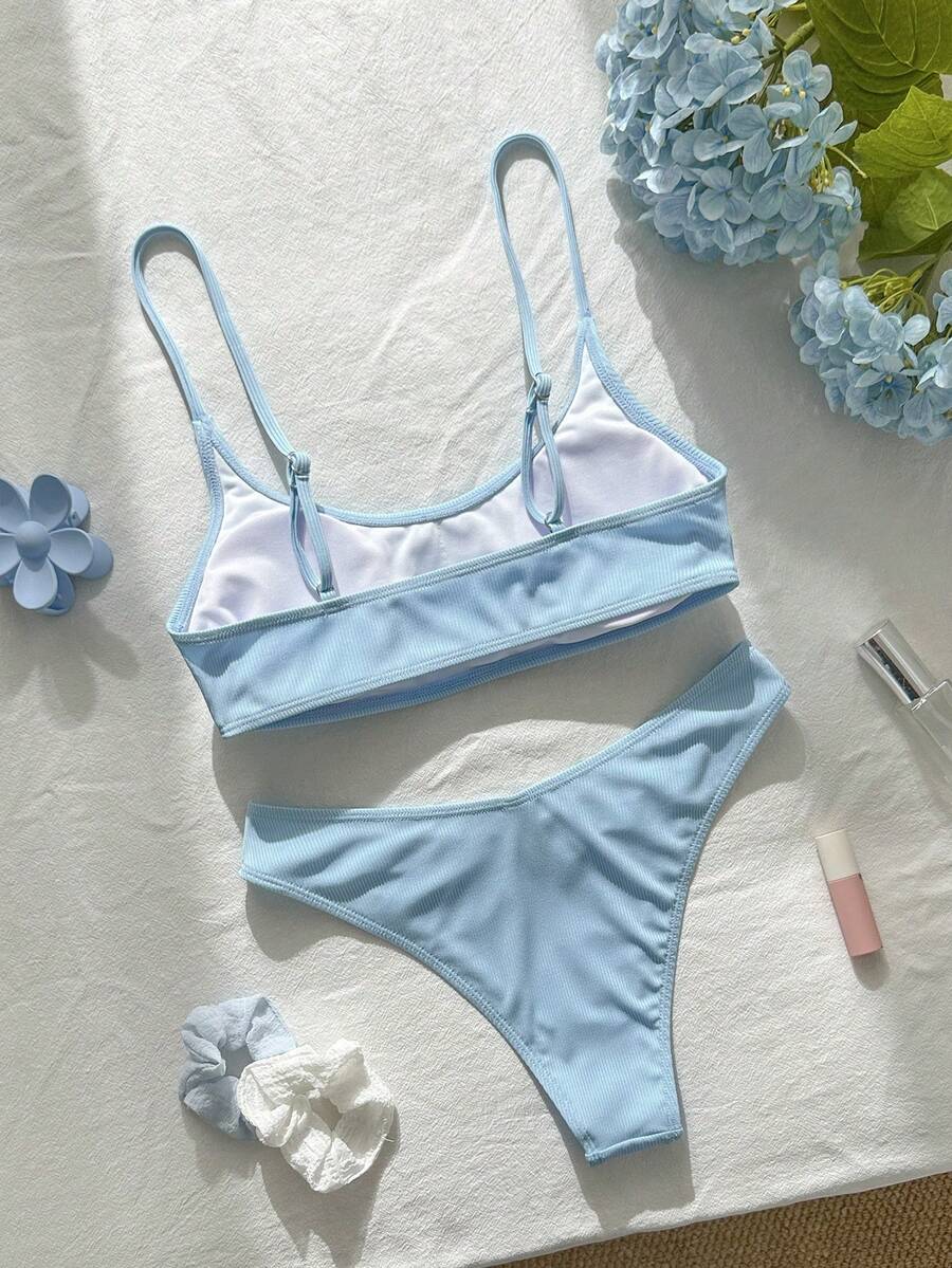 Apricot ribbed high waist two piece bikini swimsuit set for women featuring backless spaghetti strap top and high waisted bottoms.
