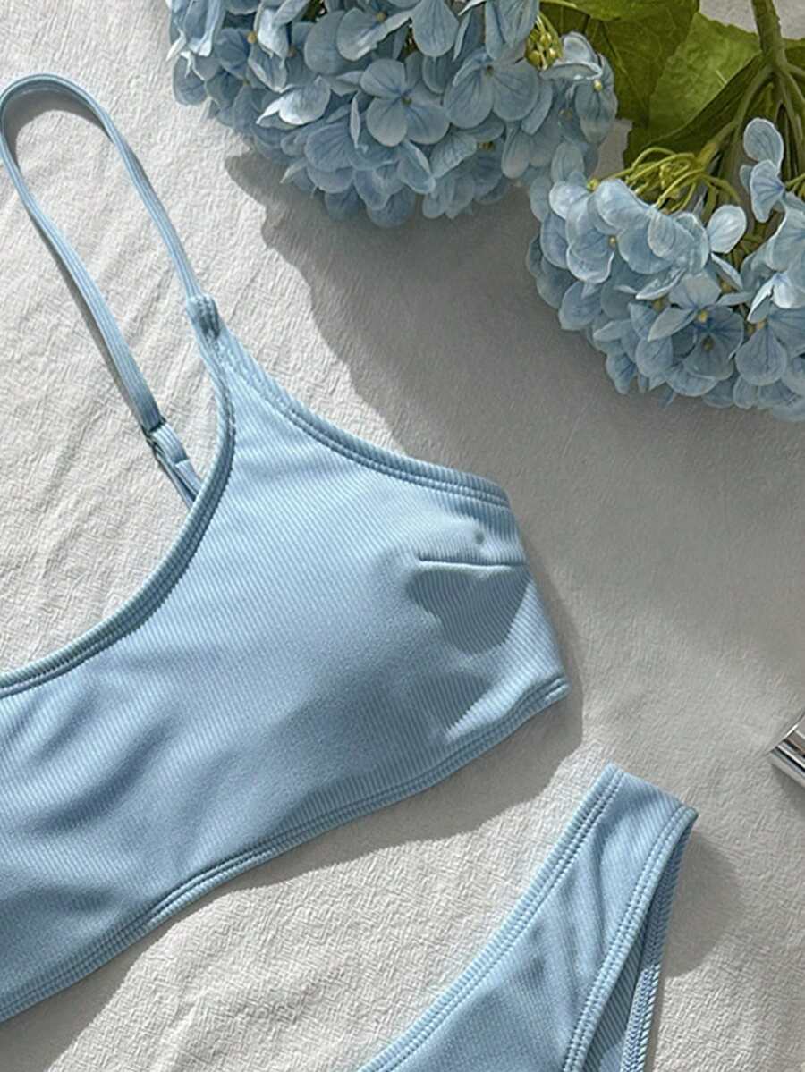 Apricot ribbed high waist two piece bikini swimsuit set for women featuring backless spaghetti strap top and high waisted bottoms.