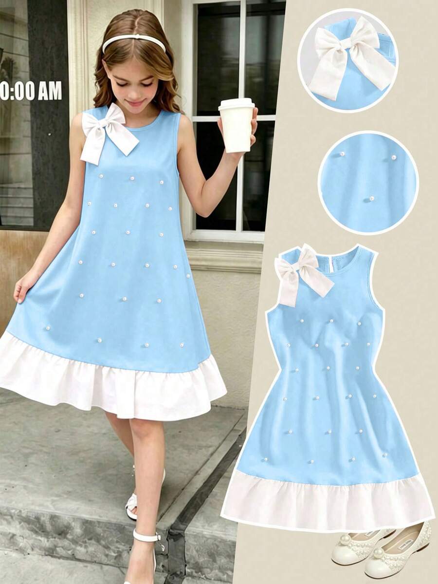 Yellow sleeveless colorblock dress for girls featuring a round neck, ruffle hem, and front bow detail.