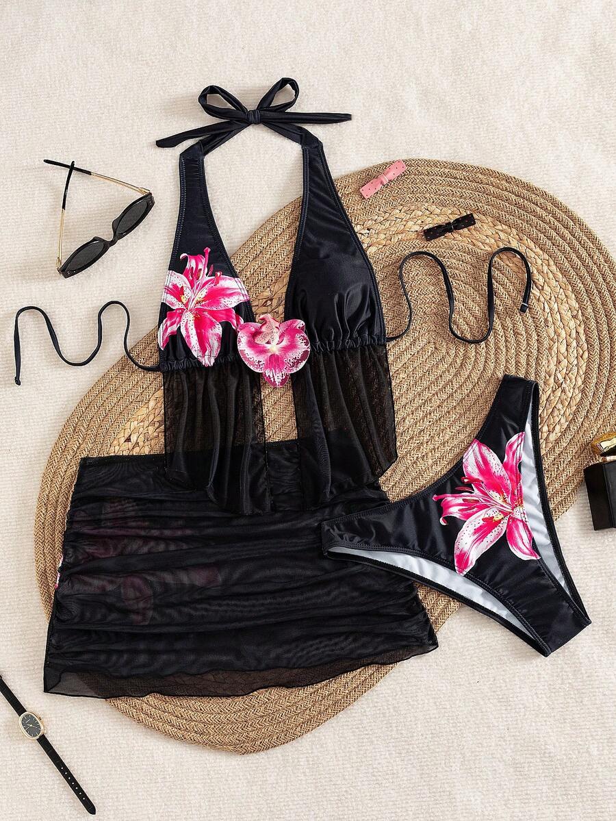 Women's 3-piece floral bikini set featuring a multicolor plant print halter top with 3D rose detail, matching bikini bottoms, and short skirt cover-up