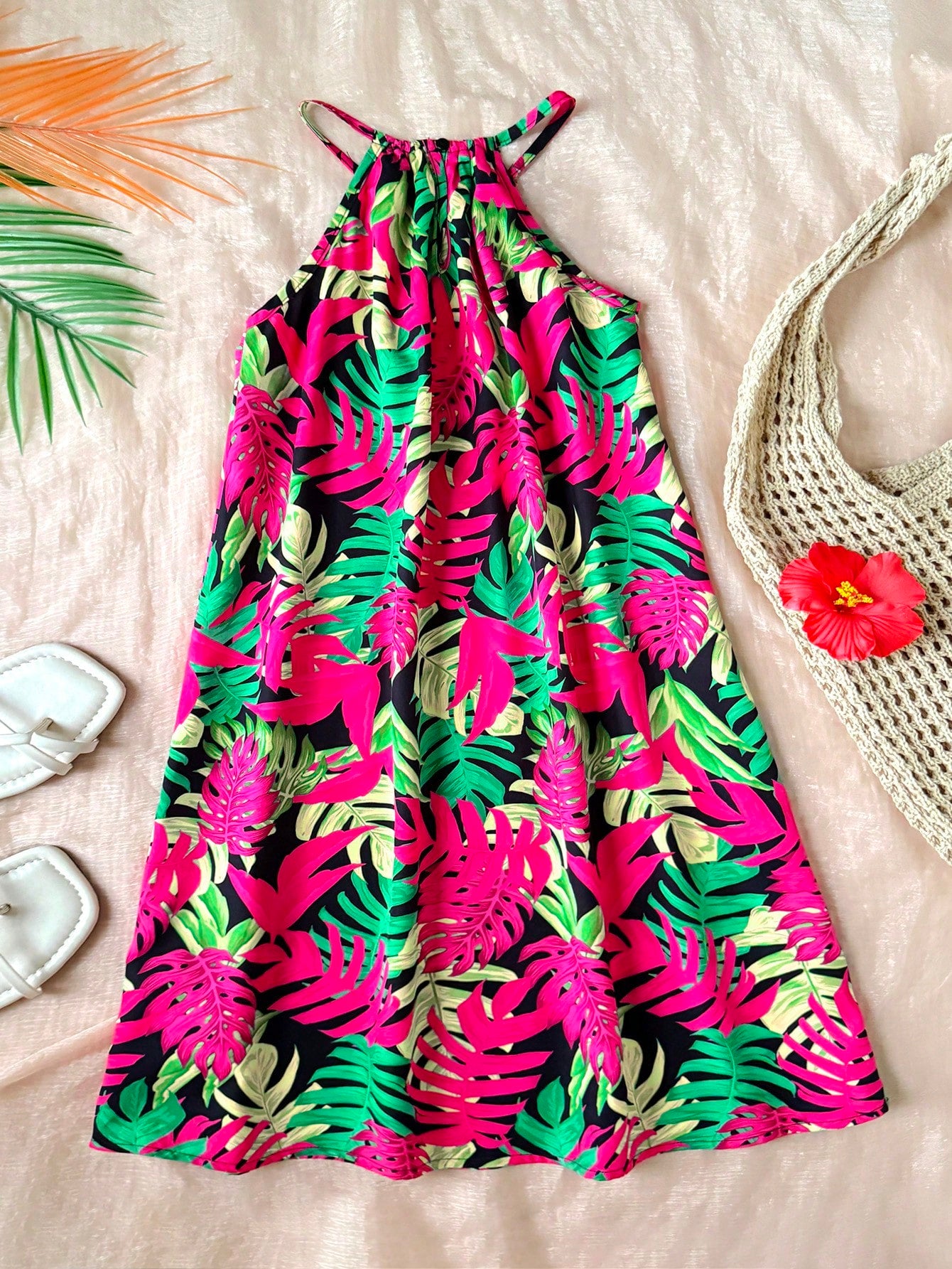 Tween girls floral print dress with halter neckline, sleeveless cold shoulder design, A-line shape, and vacation style.