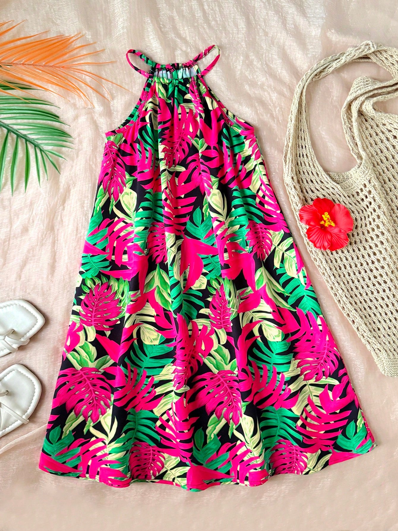 Tween girls floral print dress with halter neckline, sleeveless cold shoulder design, A-line shape, and vacation style.