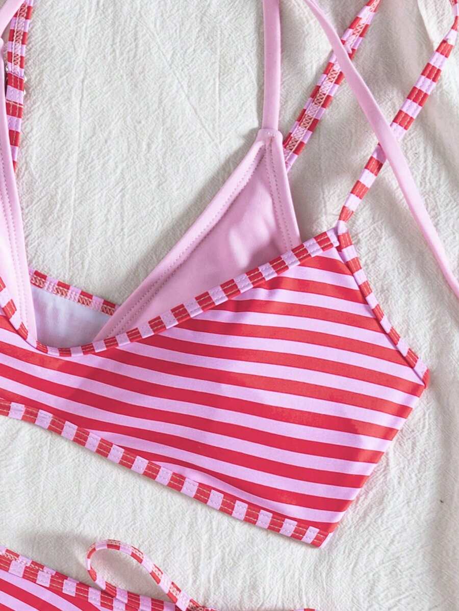 Women's color-block two-piece bikini set featuring a boho geometric pattern, tie-back halter top with removable padding, and matching tie-side bikini bottoms.
