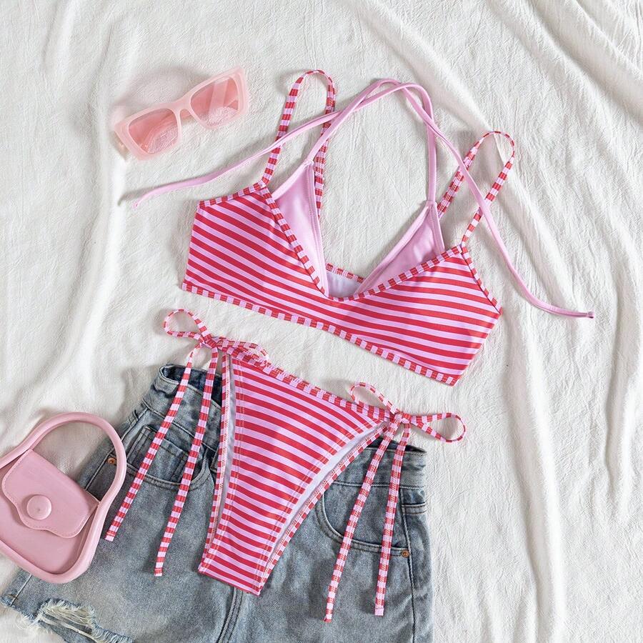 Women's color-block two-piece bikini set featuring a boho geometric pattern, tie-back halter top with removable padding, and matching tie-side bikini bottoms.