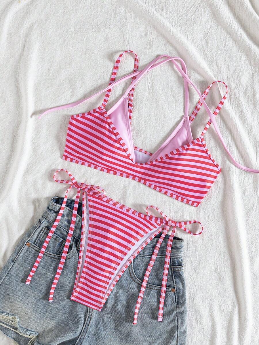 Women's color-block two-piece bikini set featuring a boho geometric pattern, tie-back halter top with removable padding, and matching tie-side bikini bottoms.
