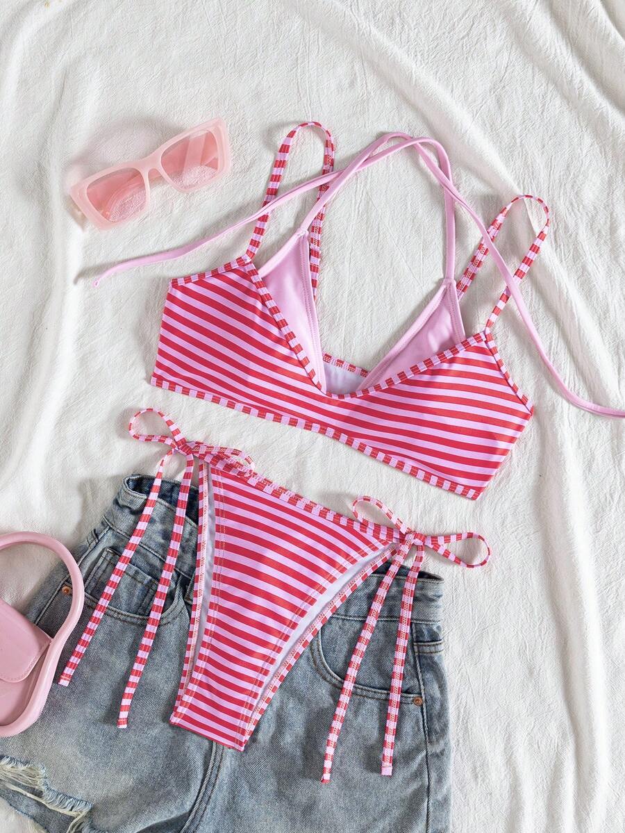 Women's color-block two-piece bikini set featuring a boho geometric pattern, tie-back halter top with removable padding, and matching tie-side bikini bottoms.