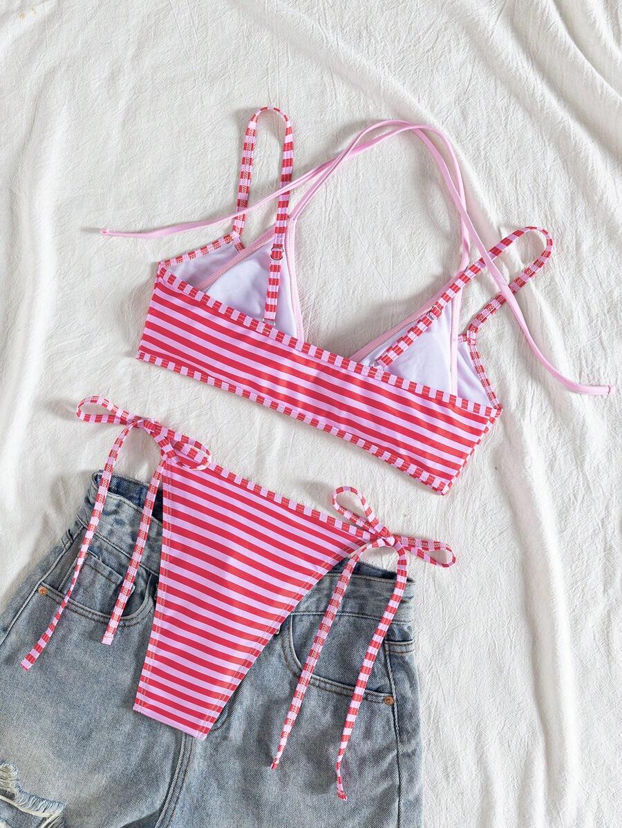 Women's color-block two-piece bikini set featuring a boho geometric pattern, tie-back halter top with removable padding, and matching tie-side bikini bottoms.