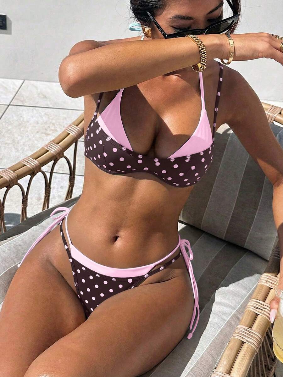 Women's retro polka dot high waist bikini swimsuit set with spaghetti straps and knot tie-back top.
