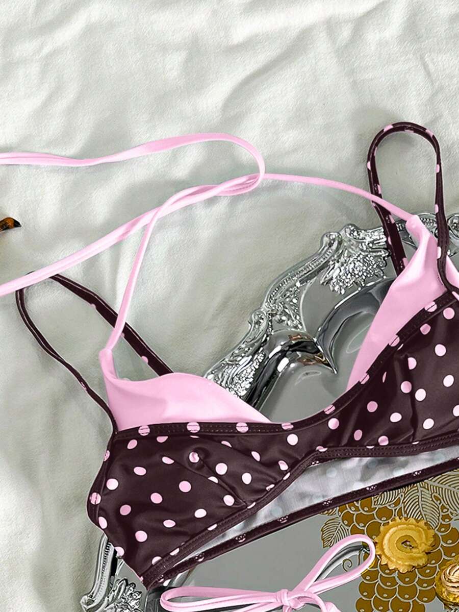 Women's retro polka dot high waist bikini swimsuit set with spaghetti straps and knot tie-back top.