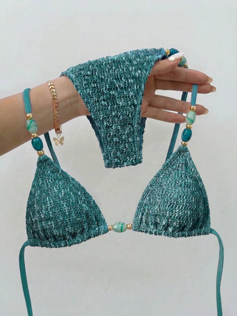 Multicolor textured beaded halter bikini set for women featuring wireless triangle cups with removable padding and ultra low waist tie side bottoms.