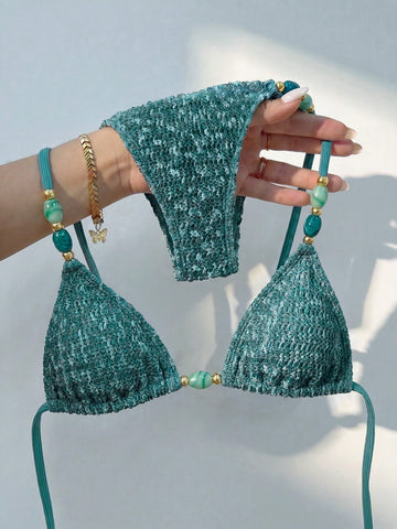 Multicolor textured beaded halter bikini set for women featuring wireless triangle cups with removable padding and ultra low waist tie side bottoms.