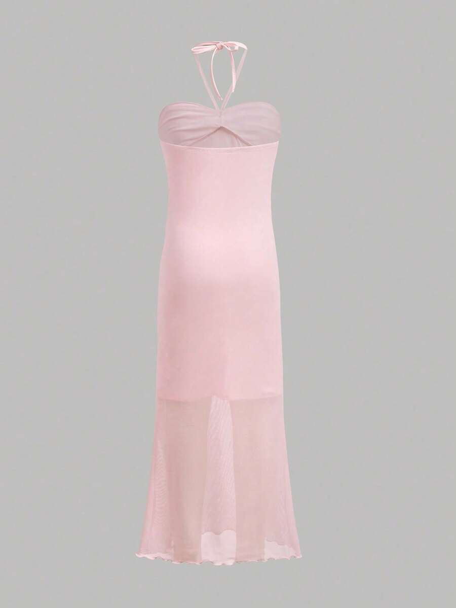 Tween girl yellow long halter dress with textured jacquard knit, sleeveless slim fit cami design, natural waist, straight hem, and lined non-sheer finish for vacation or party wear.
