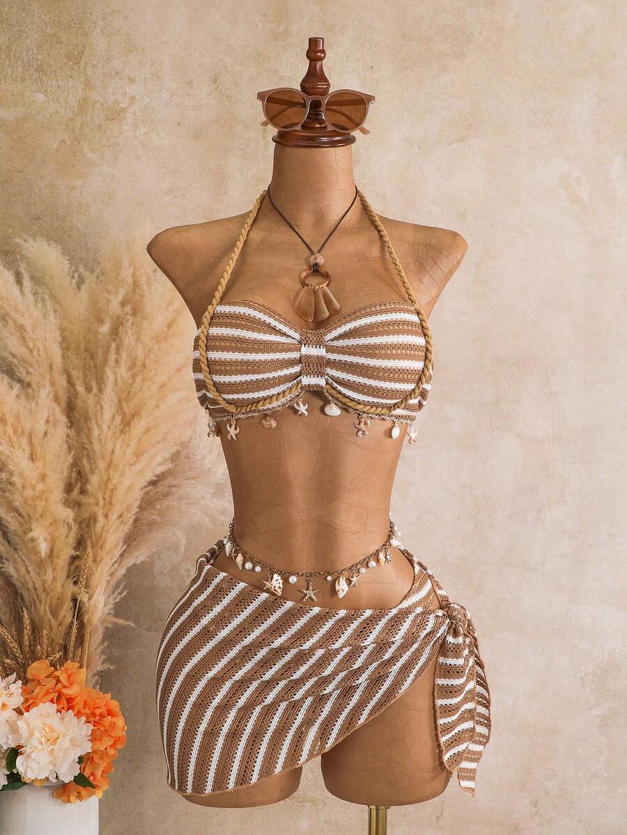 Multicolor striped 3-piece bikini set for women featuring a halter neck top with shell trim and low waist high cut bottoms.