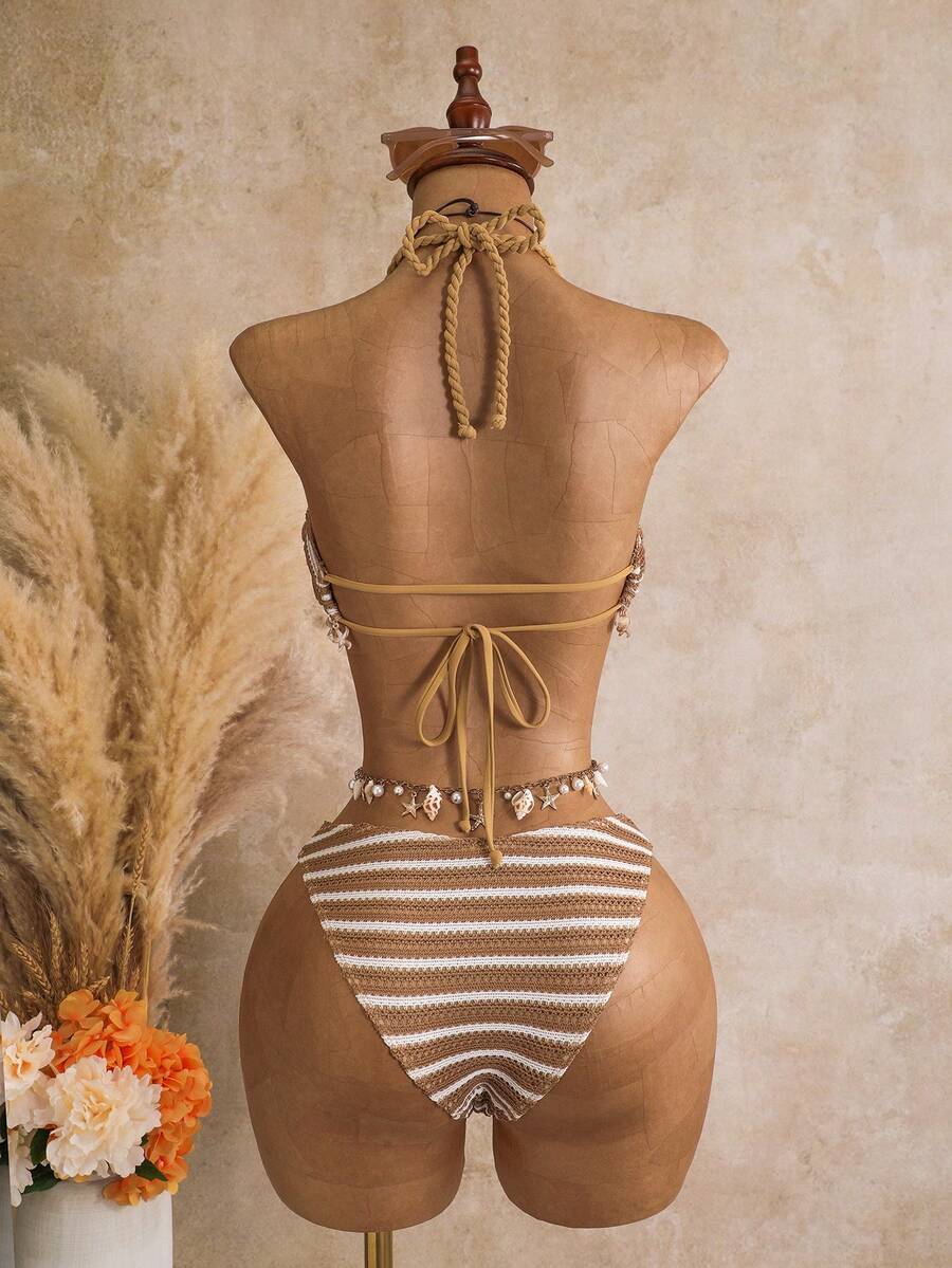 Multicolor striped 3-piece bikini set for women featuring a halter neck top with shell trim and low waist high cut bottoms.