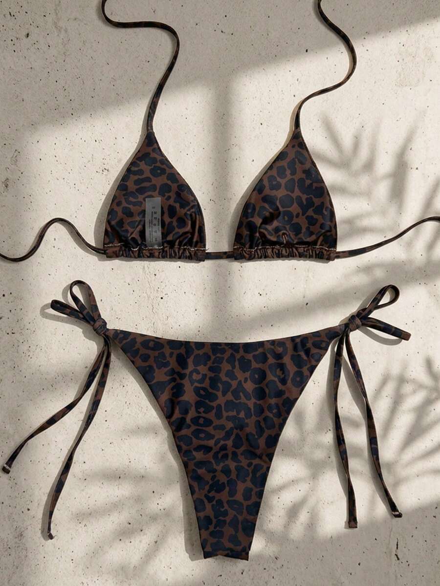 Women's high waist 2-piece triangle bikini set featuring colorblock trim, halter neckline, wireless bra with removable padding, and tie-side bottoms.