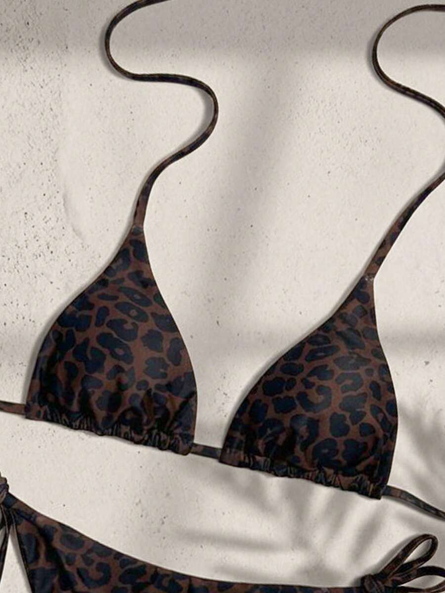 Women's high waist 2-piece triangle bikini set featuring colorblock trim, halter neckline, wireless bra with removable padding, and tie-side bottoms.
