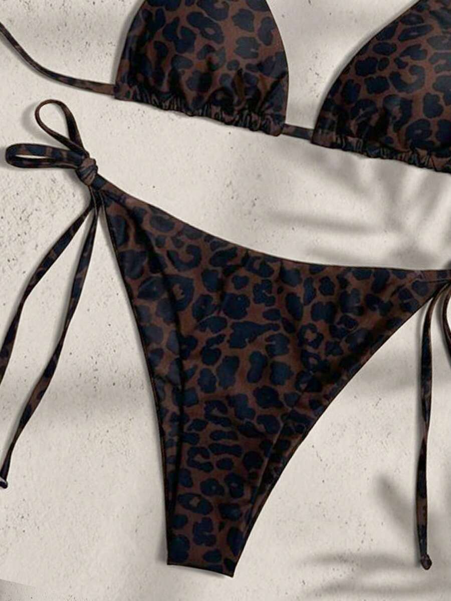 Women's high waist 2-piece triangle bikini set featuring colorblock trim, halter neckline, wireless bra with removable padding, and tie-side bottoms.