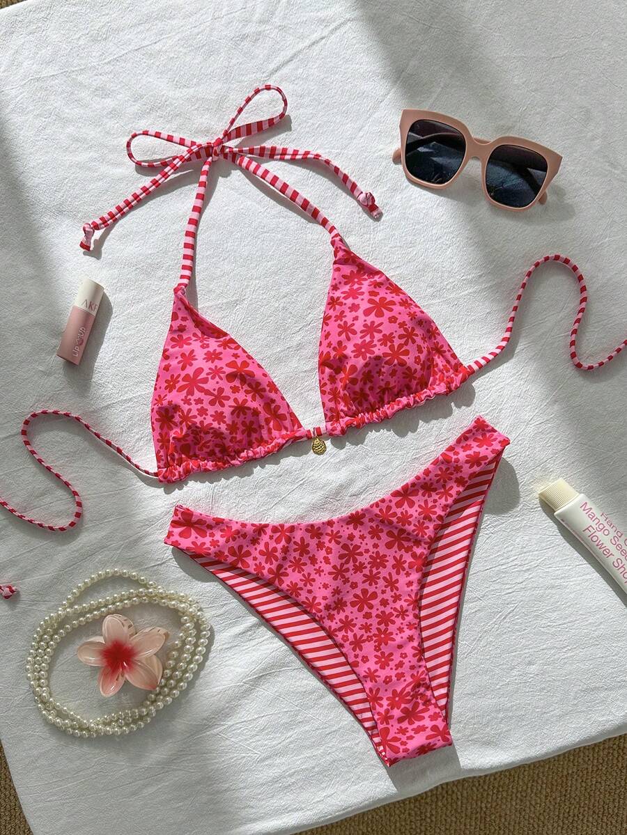 Women's black textured plaid 2-piece bikini set featuring a halter neckline, wireless triangle cups with removable padding, and mid-waist bottoms.