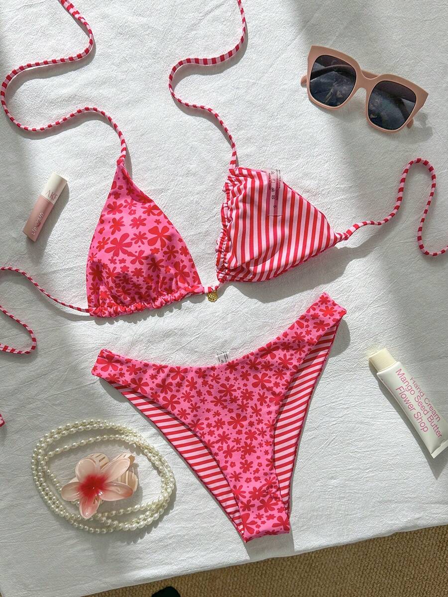 Women's black textured plaid 2-piece bikini set featuring a halter neckline, wireless triangle cups with removable padding, and mid-waist bottoms.