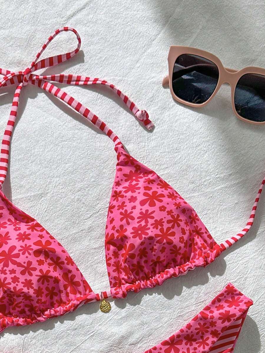 Women's black textured plaid 2-piece bikini set featuring a halter neckline, wireless triangle cups with removable padding, and mid-waist bottoms.