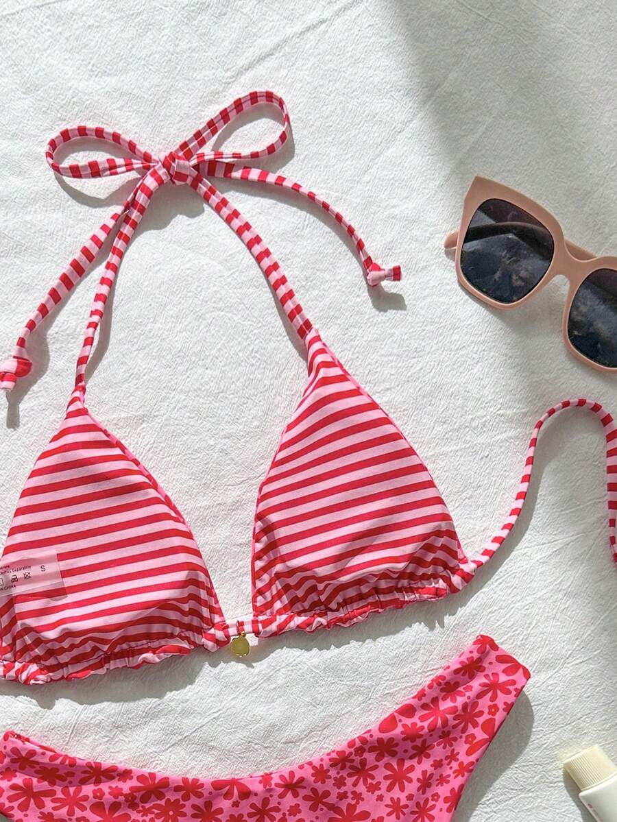 Women's black textured plaid 2-piece bikini set featuring a halter neckline, wireless triangle cups with removable padding, and mid-waist bottoms.