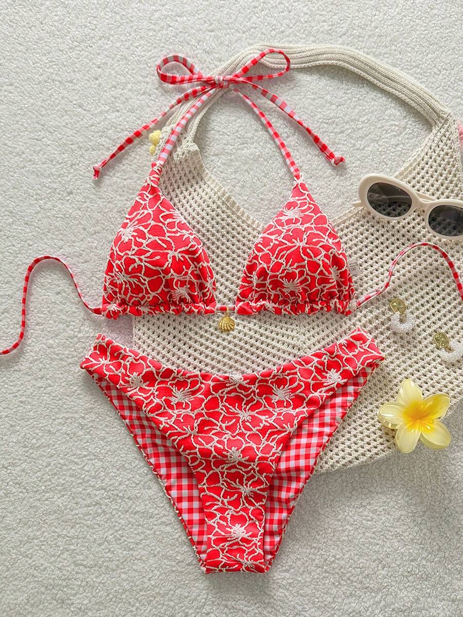 Women's black textured plaid 2-piece bikini set featuring a halter neckline, wireless triangle cups with removable padding, and mid-waist bottoms.