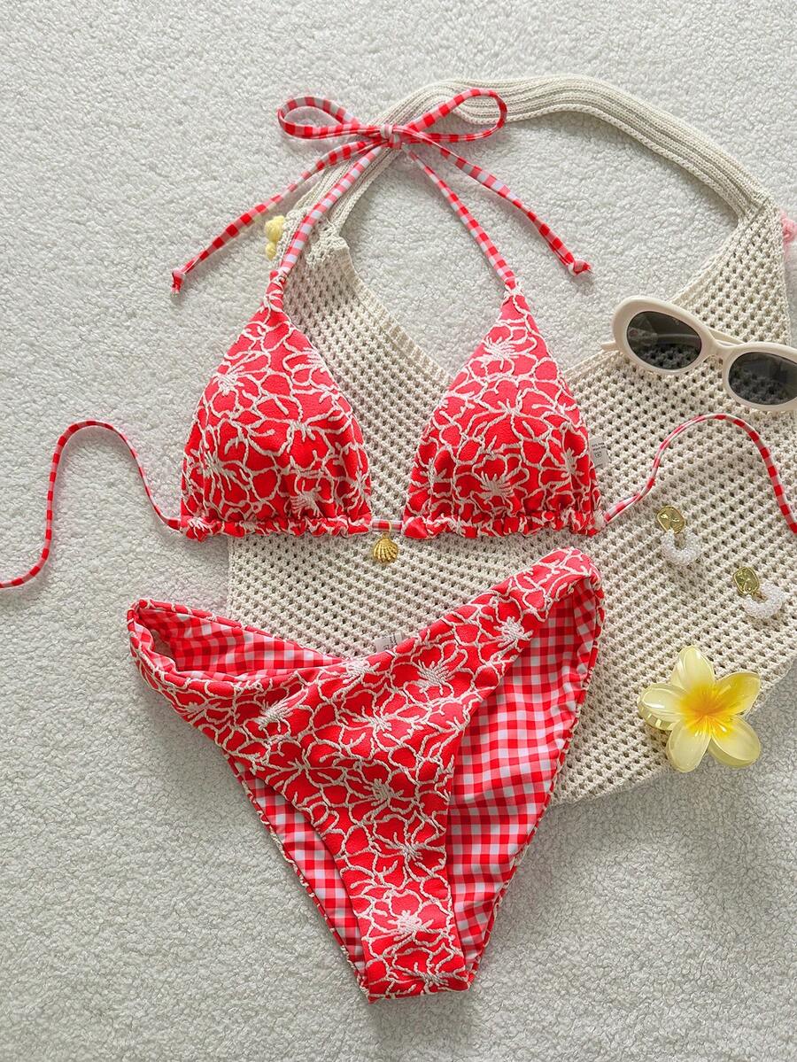 Women's black textured plaid 2-piece bikini set featuring a halter neckline, wireless triangle cups with removable padding, and mid-waist bottoms.