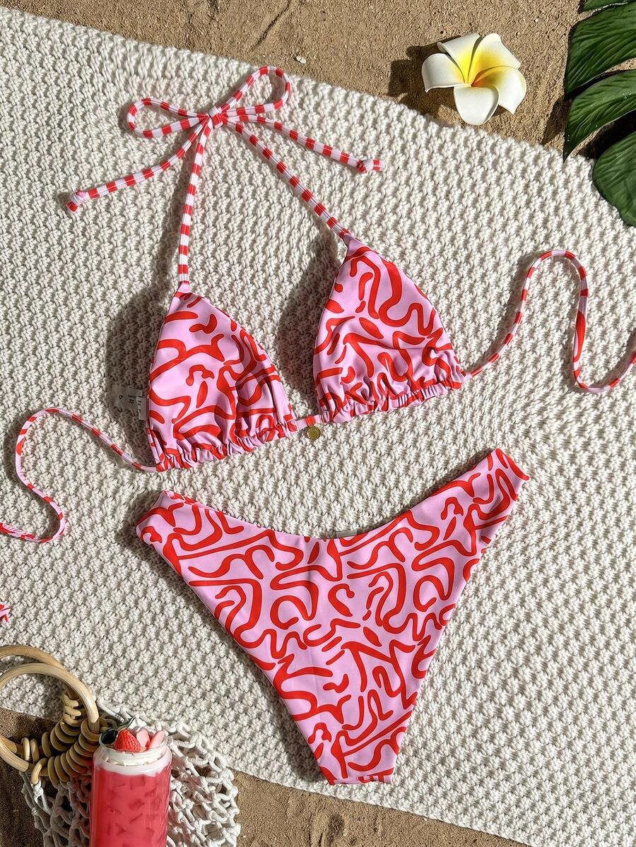 Women's black textured plaid 2-piece bikini set featuring a halter neckline, wireless triangle cups with removable padding, and mid-waist bottoms.