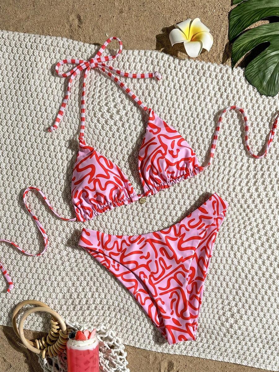 Women's black textured plaid 2-piece bikini set featuring a halter neckline, wireless triangle cups with removable padding, and mid-waist bottoms.