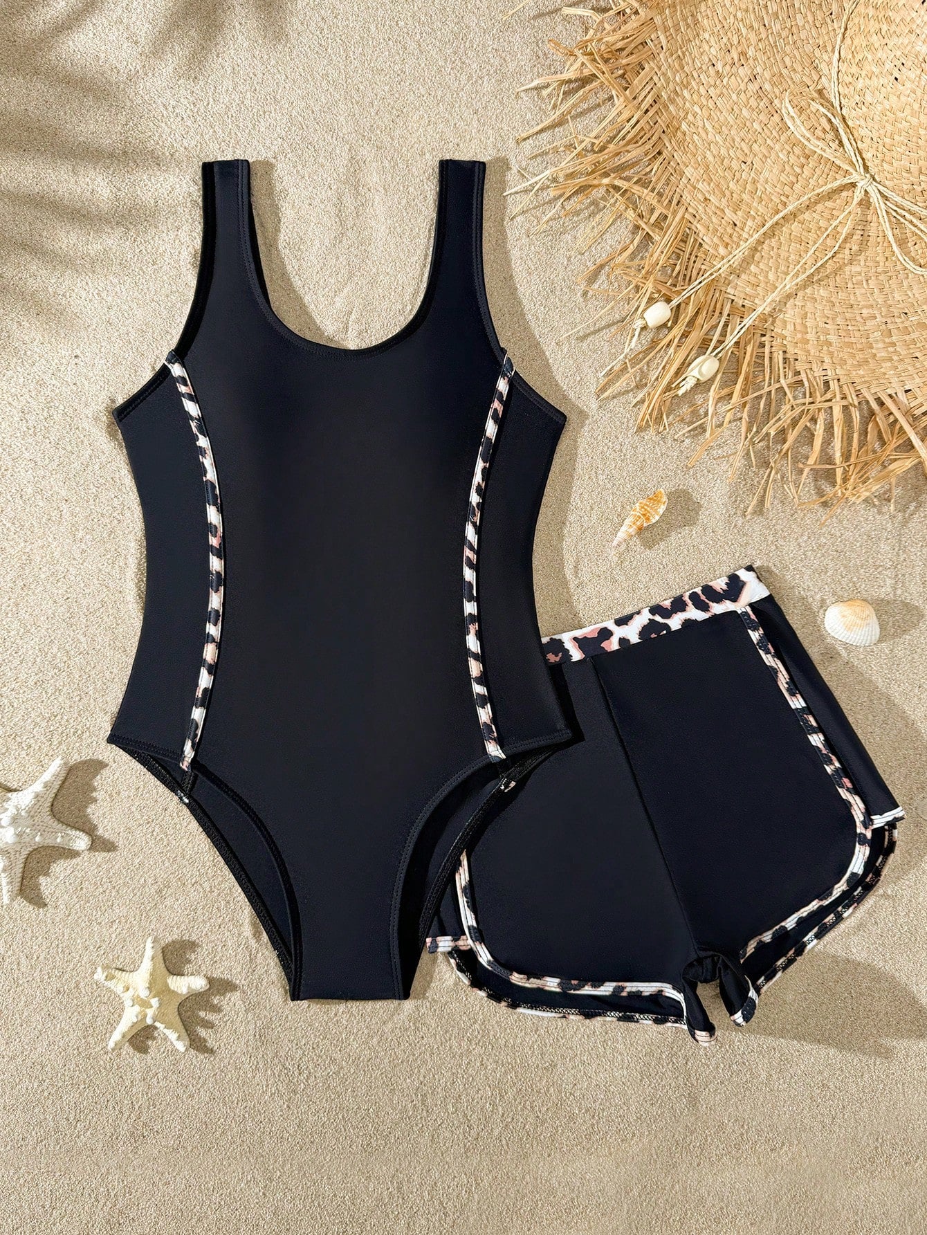 Girls baby blue striped 2-piece swimsuit set with sleeveless scoop neck one-piece, contrast piping, and matching swim shorts for beach and pool wear.
