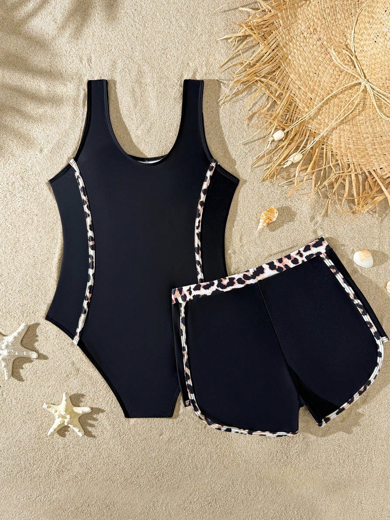 Girls baby blue striped 2-piece swimsuit set with sleeveless scoop neck one-piece, contrast piping, and matching swim shorts for beach and pool wear.