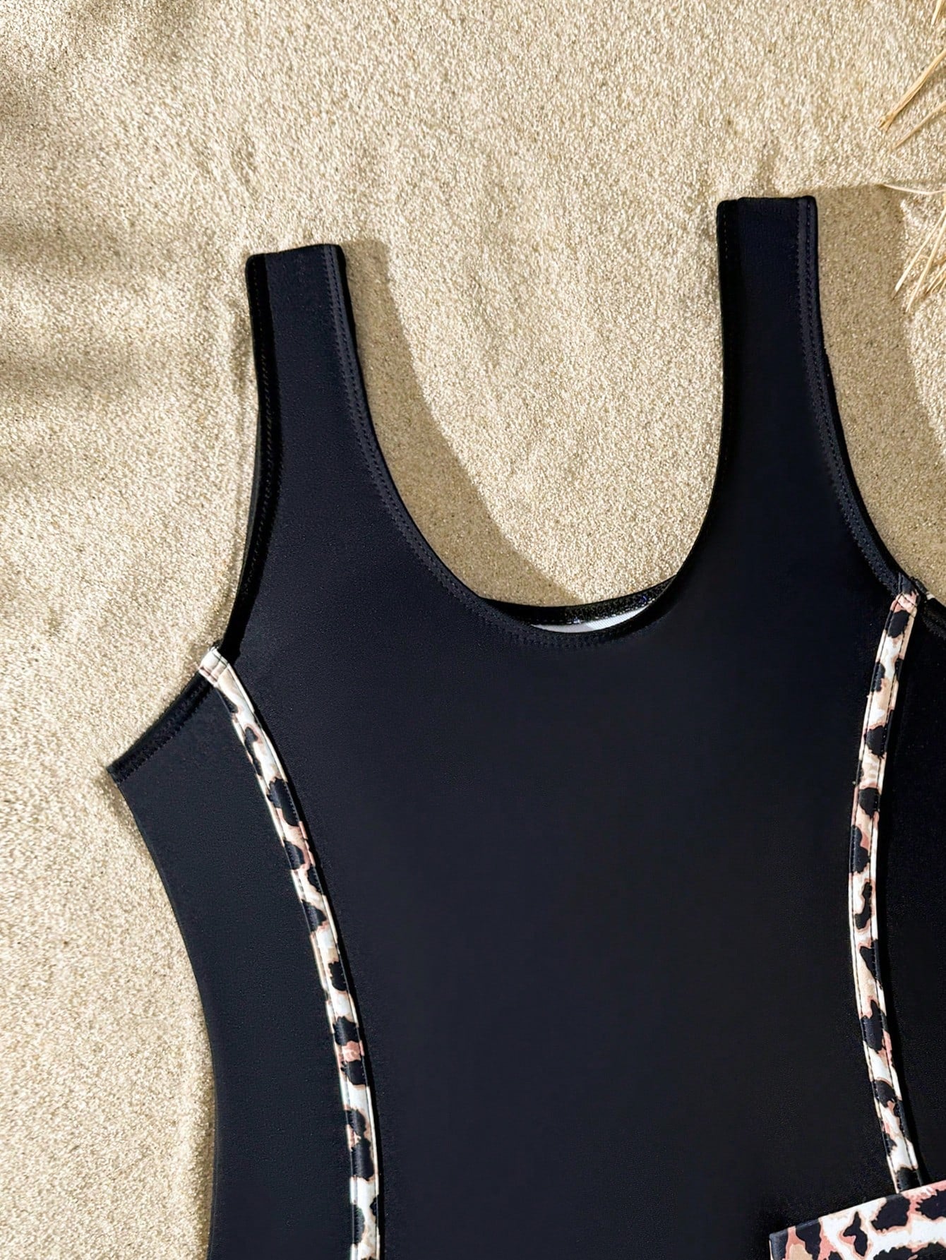 Girls baby blue striped 2-piece swimsuit set with sleeveless scoop neck one-piece, contrast piping, and matching swim shorts for beach and pool wear.
