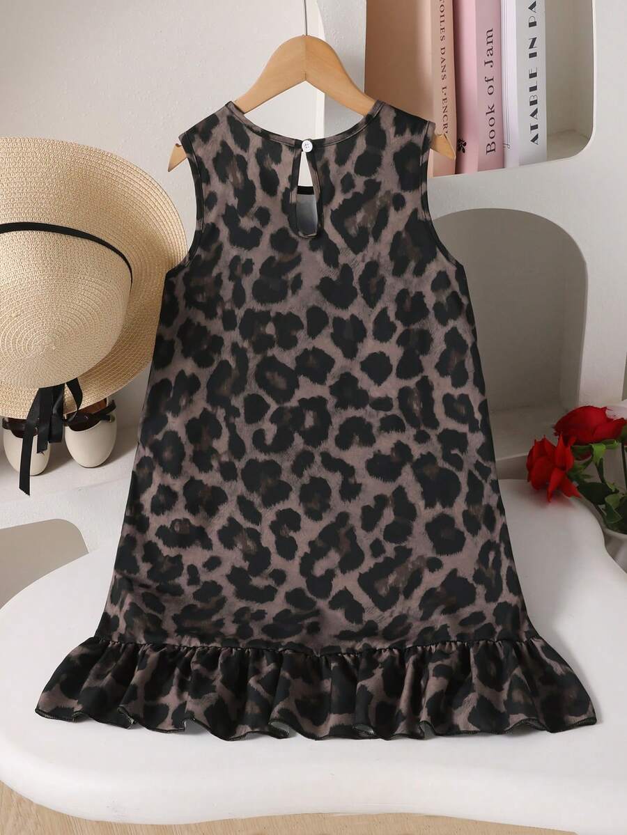 Tween girls casual leopard print smock mini dress featuring a round neck and flounce ruffle hem.
