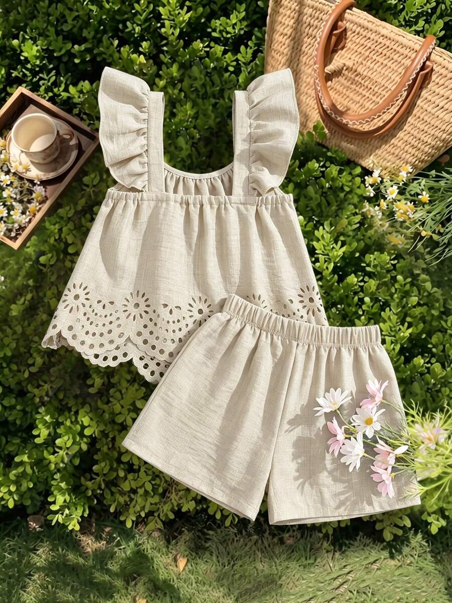Tween girls 2-piece bohemian outfit set in apricot featuring a square neck embroidered sleeveless camisole top and matching floral wide leg shorts.
