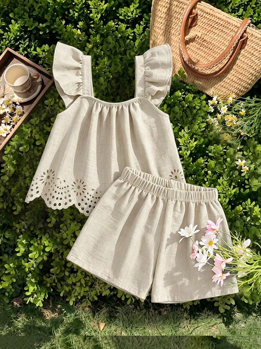 Tween girls 2-piece bohemian outfit set in apricot featuring a square neck embroidered sleeveless camisole top and matching floral wide leg shorts.