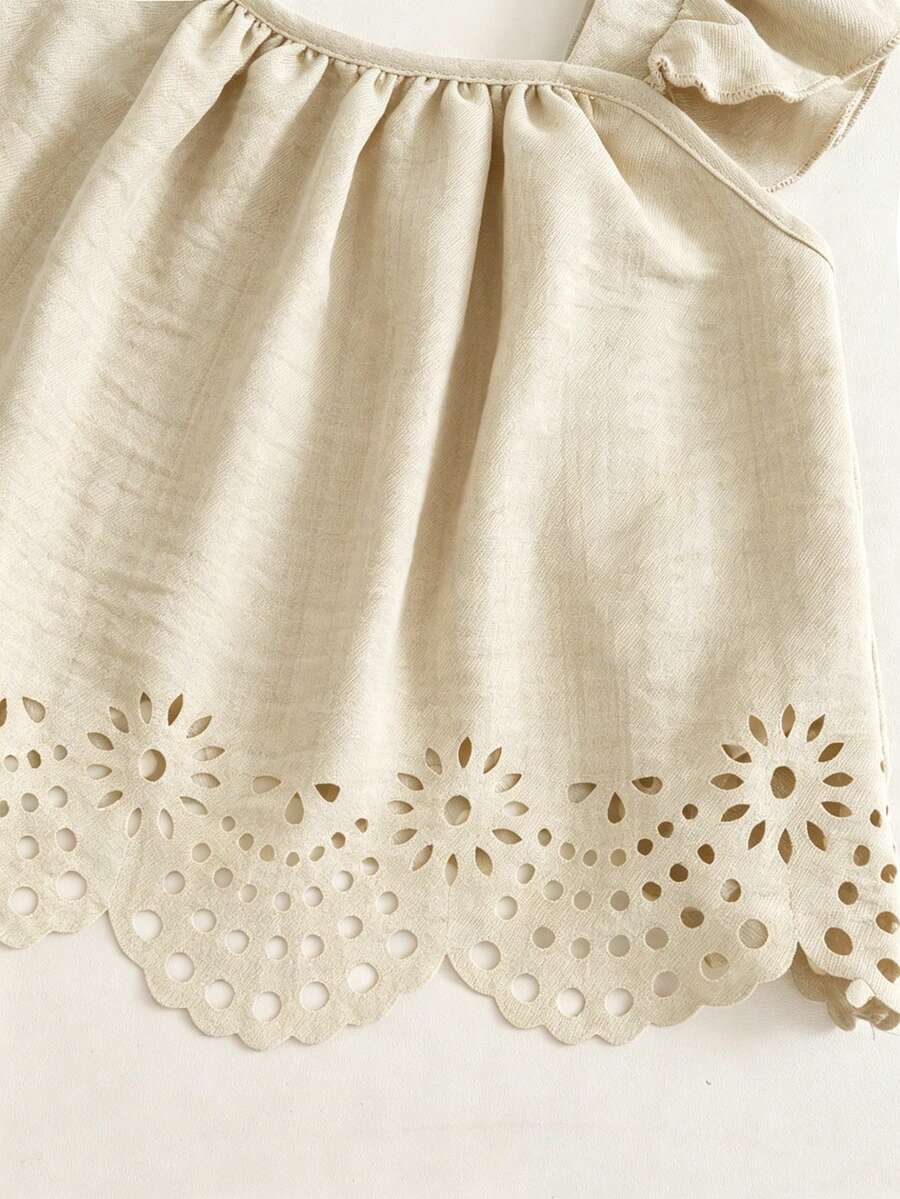 Tween girls 2-piece bohemian outfit set in apricot featuring a square neck embroidered sleeveless camisole top and matching floral wide leg shorts.