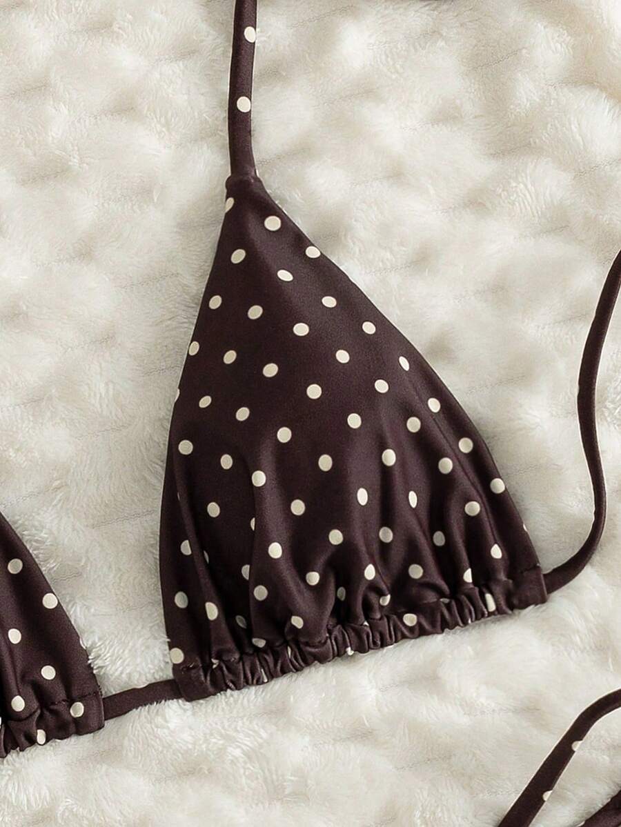 Women's printed halter neck tie two-piece swimwear featuring a wireless triangle top with removable padding and high-waist high-cut bikini bottoms.